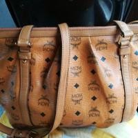 ราคา MCMมือสองสีน้ำตาลสภาพ90%ราคาต่อรองได้นะคะ ขอภาพเพิ่มเติมได้ค่ะ (1390937848)