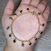 ราคา สร้อยข้อมือเงินแท้ชุบทองประดับทับทิมสีม่วง (26604390410)