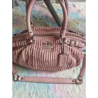 ราคา กระเป๋า coach มือสองสีชมพู (13558770265)