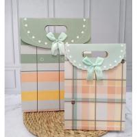 ราคา ถุงกระดาษพร้อมริบบิ้น 879 / SIZE M & XL (41305714346)