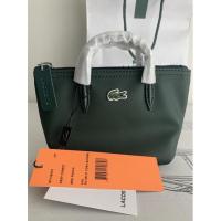 ราคา กระเป๋าถือสีเขียว ใบเล็กน่ารัก แบรนด์ Lacoste ของแท้ จาก shop ของใหม่ ไม่เคยใช้ ป้ายยังอยู่ (18836875629)