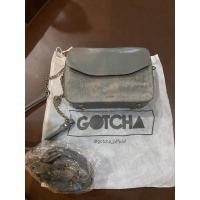 ราคา gotcha เหมือนใหม่ มีสายสะพาย2แบบ(shop1,980฿) (5558404874)