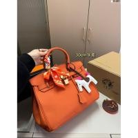 ราคา กระเป๋าถือ Hermès สีส้ม ดีไซน์คลาสสิกพร้อมหัวเข็มขัด (42911230647)