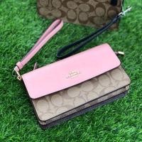 ราคา พร้อมส่งของแท้ FOLDOVER WRISTLET IN BLOCKED SIGNATURE CANVAS (COACH F76829) (5405477439)