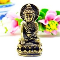 ราคา พระไภษัชยคุรุพุทธเจ้า พิมพ์พระกริ่งปวเรศ ด้านหลังเป็นวงล้อรัศมีธรรม เนื้อทองเหลือง ประมาณ3ซม. (13764155339)