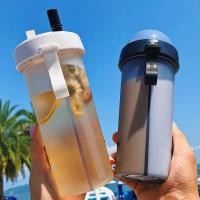 ราคา 【ส่งไว】แก้ว 2 ช่อง ความจุ 600 มล. พร้อมฝาและหลอด แก้วพลาสติกคุณภาพสูง พร้อมหูหิ้ว พกพาสะดวก (54950836307)