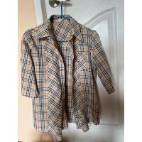 ราคา เสื้อเชิ้ตแขนยาวลายสก็อตสีครีม (21994587432)