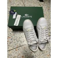 ราคา รองเท้าผ้าใบ lacoste สีขาว ของแท้ ออกจากช้อป เบอร์39 สภาพดี (25632981911)