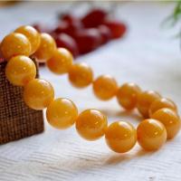ราคา สร้อยข้อมือหยกหยกเหลืองน้ำผึ้ง 13.7 mm. สร้อยข้อมือหยก หยกพม่าแท้ 100% (21467018305)