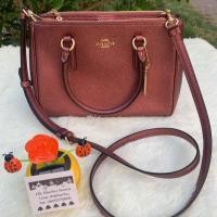 ราคา Coach mini surrey สีแดงเมทัลลิค (6432298863)