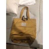 ราคา Tathata - Swift iconic กระเป๋าเป้ ผ้าแคนวาส สีมัสตาร์ด มือสอง (14445384840)