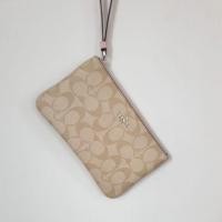 ราคา กระเป๋าคล้องมือ coach ของแท้ 1 ซิปไซส์ L มือสองใหม่เอี่ยม 1,000 บาท (2645146332)