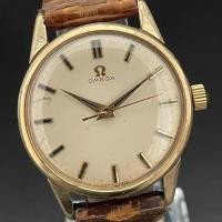 ราคา นาฬิกาวินเทจสุดหรูจากแบรนด์ OMEGA รุ่นปี 1960 คาล์มเมอร์ Cal.285 ดีไซน์เรียบหรู สายหนังทองคำ ขนาด 34mm สไตล์ผู้ชาย เรียบง่ายแต่โดดเด่น (43221564456)