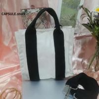 ราคา กระเป๋ามือ2 กระเป๋าผ้าดิบขาว-ดำ อะไหร่เงิน ถือได้ สะพายได้(สายสะพายสีดำ) สายปรับไม่ได้ (20762861182)