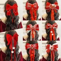 ราคา กิ๊บติดผมโบว์สีแดงสำหรับปีใหม่ ขนาดใหญ่พร้อมพู่ เหมาะสำหรับงานรื่นเริงและการทำสไตล์ผมของเด็ก (54154764621)