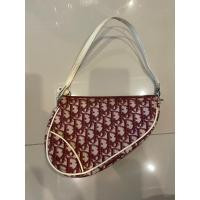 ราคา กระเป๋า dior vintage burgundy cream saddle pochette bag (19695017701)