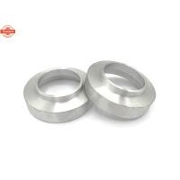 ราคา 1 คู่ 2 ตัว อลูมิเนียมรองคอยล์สปริงหน้า Mitsubishi L200,Strada 2wd,Triton ตัวเตี้ย หนา 1 นิ้ว (43667772377)