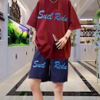 ราคา ชุดเสื้อยืดกับกางเกงขาสั้นสกรีนลายเสื้อผ้าคอตตอนราคาพิเศษ+กางเกงผ้าวอร์ม มาเป็นชุดในราคาสุดคุ้ม< รหัส 2012 กางเกงสีกรม > (21691558740)