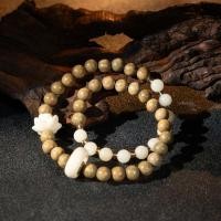 ราคา สร้อยข้อมือไม้ 10 เม็ด งาช้างเทวา+ไม้จันทน์หอมแท้ งานแฮนด์เมด เรียบหรูใส่ได้ทุกวัน (45304808419)