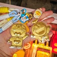 ราคา พวงกุญแจโดเรม่อน ฟอยล์สีทองน่ารักโดราเอมอนโทรศัพท์มือถือจี้กระเป๋าจี้เทศกาลของขวัญ (57553856597)