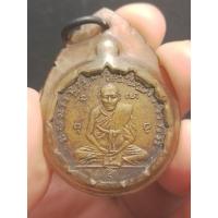 ราคา เหรียญห่วงเชื่อม รุ่น2 หลวงพ่อกลั่น วัดพระญาติการาม พิมพ์นะกลม อยุธยา ปี2479 (21176441251)