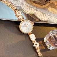 ราคา นาฬิกาข้อมือควอตซ์หน้าปัดกลมดีไซน์มินิมอลไม่ซ้ำใครสำหรับผู้หญิง, กำไลเรซิ่นแบบอสมมาตร (51454426072)
