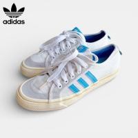ราคา รองเท้ามือสอง Adidas Original รุ่น Nizza สีขาว แถบสีฟ้า ไซส์ 7 ( 25 cm ) สภาพดี ไม่มีตำหนิ (56254137087)