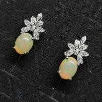 ราคา ต่างหู โอปอล Opal พลอยแท้ หลังเบี้ย ขนาด 6×8 มม.ล้อม CZ ใบมะกอก ตัวเรือนเงิน 925 (5948656672)