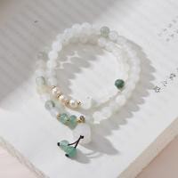 ราคา สร้อยข้อมือไข่มุกน้ำจืดจี้ดอกลิลลี่แห่งหุบเขาสามวงกลมสีเขียวจากไหมทองและหยกเทียนซาน (27184082293)