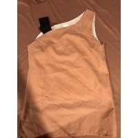 ราคา เสื้อแขนกุดไหล่สีโอรส (14066421041)