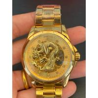 ราคา นาฬิกา ลายมังกร สีทอง เรือนใหญ่ automatic มือสอง สภาพดี (44300131897)