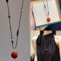 ราคา สร้อยคอกิ๊บซ์ไม้กฤษณา สไตล์ภาคใต้ ประดับลูกปัดสีแดง (49857567884)