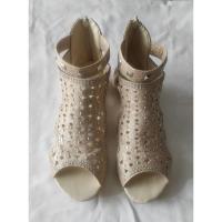 ราคา รองเท้าแฟชั่น ข้อสูง Size 38 สีทอง มือสอง (21584055063)