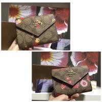 ราคา กระเป๋าสตางค์ใบสั้นCoach ลายดอกไม้ (8311280036)