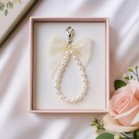 ราคา JwDIY พวงกุญแจริบบิ้นผ้าแก้ว โบว์ สองชั้นประดับพชรไข่มุกสีขาว+ลูกปัดสีใสรุ้ง ที่ห้อยกระเป๋า พวงกุญแจ อื่นๆ (40670752971)