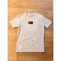 ราคา เสื้อยืดคอกลม Calvin Klein Jeans สีเทา Size M ของแท้ สภาพ 95% (40322237983)