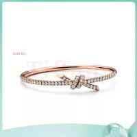 ราคา Bold Statement Luxury Bangle | Tiffany Knot Hinged Bangle in 18K Gold with Pavé Diamonds (55458185492)