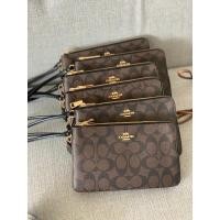 ราคา กระเป๋าคล้องมือ COACH DOUBLE ZIP WRISTLET (9175595385)