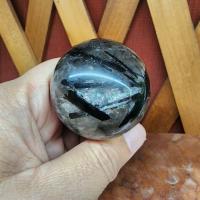 ราคา หินลูกกลมแก้วขนเหล็ก(Rutile Quartz)ลูกกลมหินแก้วขนเหล็ก ไหมดำ ขนาด 4.3 ซม.น้ำหนัก 115 g. (45008744690)
