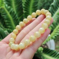 ราคา สร้อยข้อมือหยกเหลืองติดขาวเนื้อแก้วหยกพม่าแท้ธรรมชาติ (48359295252)