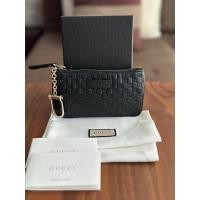 ราคา New Gucci Coin กระเป๋าใส่เหรียญแบบพวงกุญแจ สีดำ ของแท้ % (17592195479)