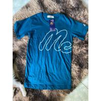 ราคา เสื้อยืดmc สีเขียวน้ำทะเลติดป้ายแท้ (16193633787)