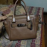 ราคา กระเป๋า Coach Swagger 21 สีน้ำตาล (1987164878)