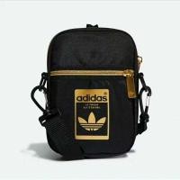 ราคา กระเป๋าสะพายข้างสีดำโลโก้สีทองadidas (6962739325)