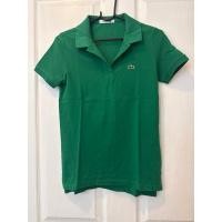 ราคา สินค้ามือสองเสื้อโปโล แขนสั้น สีเขียว size36 Lacoste ของแท้*ตำหนิรูแขนซ้าย (40328312173)