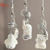 ราคา UK เคสโทรศัพท์ลายฝูงนกเพนกวินขนยาวเป็นพวงพวงกุณแจตัวการ์ตูนตุ๊กตาสัตว์มีจี้ห้อยประดับกระเป๋ามีสายคล้องตกแต่งกระเป๋า (50608774705)