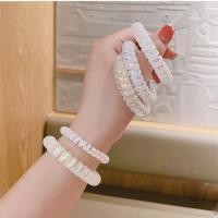 ราคา พร้อมส่ง#TH58 Hair band ยางมัดผมแบบเกลียว เกาหลี มสีมุกใส 1 เส้น (21134917807)