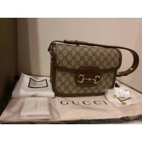 ราคา sold ! GUCCI Beige & Brown GG Supreme 'Gucci 1955' Horsebit Bag (6057289386)