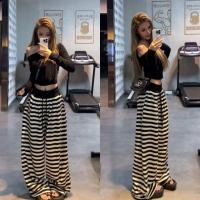 ราคา กางเกงขายาวทรงหลวมเอวสูงลายทางสีดำและสีขาวสไตล์ฤดูร้อนใหม่ ดีไซน์เย็บเอวยางยืด กางเกงลำลองทรงหลวมลายทางสีตัดกัน (49355069462)