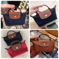 ราคา พร้อมส่ง ** Longchamp le Pliage Mini Pouch รุ่น Classic & Green (17545347670)